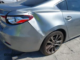 2014 Mazda 6 i Grand Touring с VIN JM1GJ1W6XE1159641, выставлен на аукционе IAAI как лот 39305628 с пробегом 107 853 миль миль и . История ставок и продаж доступна на DreamBid. Изображение 12.