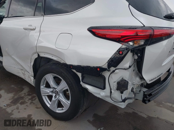 2022 Toyota Highlander LE z VIN 5TDBZRBH1NS216174, wystawiony jako IAAI lot #41903427 z przebiegiem 68 671 mil mil oraz . Historia ofert i sprzedaży dostępna na DreamBid. Obrazek 6.
