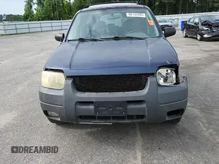 2003 Ford Escape XLT Popular with VIN 1FMCU03123KA03878, listed as a Copart auction lot 60133485 with 298,100 mi miles and Salvage title. Bid and sale history available at DreamBid. Image 13.