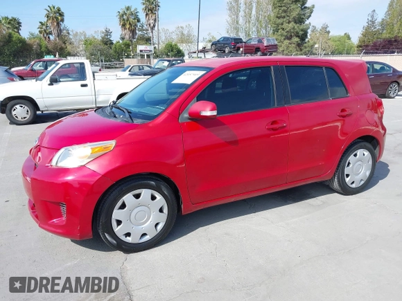 2008 Scion xD with VIN JTKKU10428J017502, listed as a IAAI auction lot 42057909 with 149,789 mi miles. Bid and sale history available at carsss.com. Image 2.