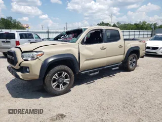 2019 Toyota Tacoma SR with VIN 3TMCZ5AN7KM263094, listed as a Copart auction lot 61901655 with 112,328 mi miles and Salvage title. Bid and sale history available at DreamBid. Image 1.