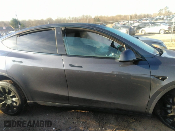 2022 Tesla Model Y Long Range with VIN 7SAYGDEE9NF424928, listed as a IAAI auction lot 41807225 with Not Provided miles and . Bid and sale history available at carsss.com. Image 12.