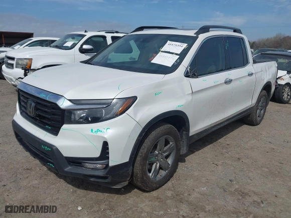 2023 Honda Ridgeline RTL-E with VIN 5FPYK3F73PB035072, listed as a IAAI auction lot 41841074 with 35,633 mi miles. Bid and sale history available at carsss.com. Image 20.
