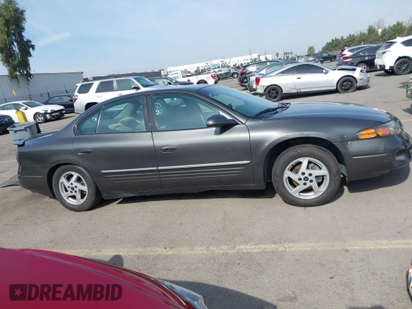 2003 Pontiac Bonneville SE z VIN 1G2HX52K934181238, wystawiony jako IAAI lot #41483636 z przebiegiem 176 737 mil mil oraz . Historia ofert i sprzedaży dostępna na DreamBid. Obrazek 13.