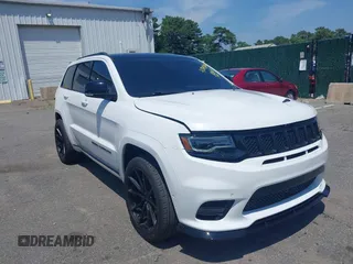 2019 Jeep Grand Cherokee Summit with VIN 1C4RJFJT1KC785744, listed as a IAAI auction lot 42645006 with 38,483 mi miles and . Bid and sale history available at DreamBid. Image 1.