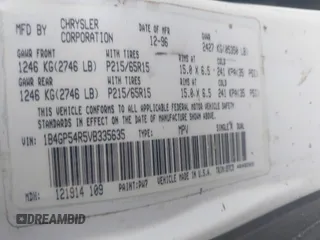 1997 Dodge Grand Caravan with VIN 1B4GP54R5VB335635, listed as a IAAI auction lot 41433559 with Not Provided miles and . Bid and sale history available at DreamBid. Image 9.