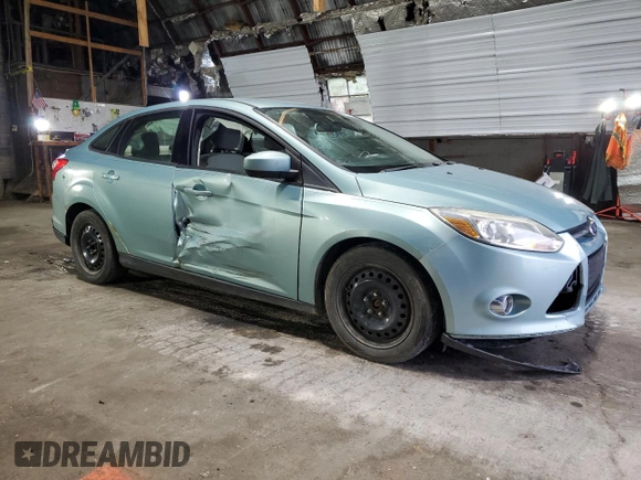 2012 Ford Focus SE with VIN 1FAHP3F27CL149328, listed as a Copart auction lot 56000325 with 147,097 mi miles and Salvage Title. Bid and sale history available at DreamBid. Image 4.