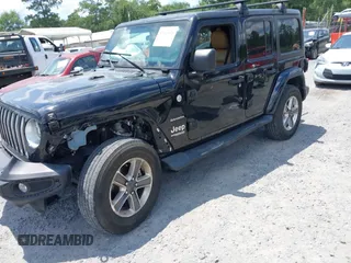 2021 Jeep Wrangler Unlimited Sahara with VIN 1C4HJXEN9MW681422, listed as a IAAI auction lot 42563426 with 48,582 mi miles and . Bid and sale history available at DreamBid. Image 6.