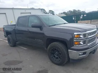 2015 Chevrolet Silverado 1500 LT with VIN 3GCUKREC9FG519510, listed as a IAAI auction lot 42026865 with 119,510 mi miles. Bid and sale history available at carsss.com. Image 1.
