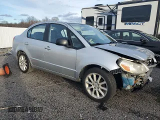 2011 Suzuki SX4 LE with VIN JS2YC5A23B6300189, listed as a Copart auction lot 85389574 with 71,272 mi miles and Clean Title. Bid and sale history available at carsss.com. Image 4.