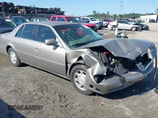 2002 Cadillac DeVille z VIN 1G6KD54Y02U299515, wystawiony jako IAAI lot #42013102 z przebiegiem 124 109 mil mil oraz . Historia ofert i sprzedaży dostępna na DreamBid. Obrazek 1.