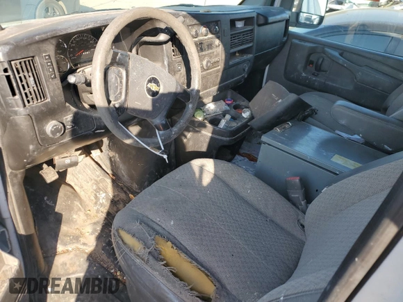 2014 Chevrolet Express Cargo Van with VIN 1GCWGGBA8E1197909, listed as a Copart auction lot 74050564 with 0 mi miles and Salvage Title. Bid and sale history available at carsss.com. Image 8.