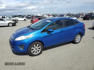 2011 Ford Fiesta SE with VIN 3FADP4BJ2BM154564, listed as a Copart auction lot 50823515 with 59,016 mi miles and Clean Title. Bid and sale history available at carsss.com. Image 1.