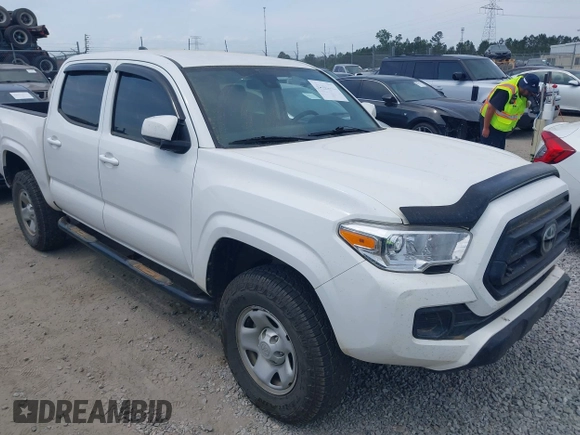 2022 Toyota Tacoma SR with VIN 3TYCZ5AN9NT098903, listed as a IAAI auction lot 42088505 with 93,000 mi miles and . Bid and sale history available at DreamBid. Image 1.