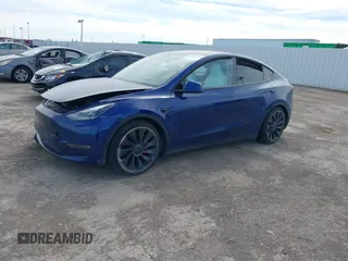 2021 Tesla Model Y Performance z VIN 5YJYGDEF8MF245641, wystawiony jako IAAI lot #41685230 z przebiegiem 25 903 mil mil oraz . Historia ofert i sprzedaży dostępna na DreamBid. Obrazek 13.