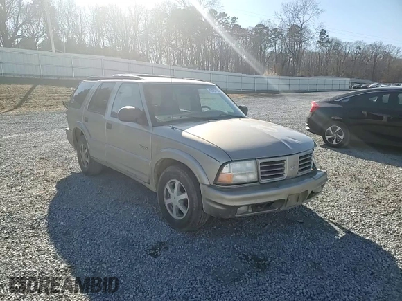2000 Oldsmobile Bravada z VIN 1GHDT13W1Y2225360, wystawiony jako Copart lot #42967155 z przebiegiem 231 720 mil mil oraz Szkody całkowita. Historia ofert i sprzedaży dostępna na DreamBid. Obrazek 11.