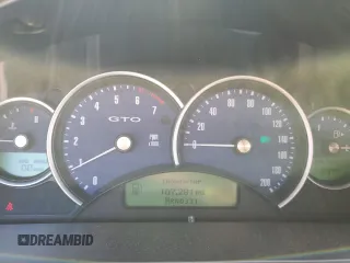 2004 Pontiac GTO with VIN 6G2VX12GX4L287389, listed as a Copart auction lot 57881874 with 107,291 mi miles and Salvage Title. Bid and sale history available at carsss.com. Image 9.