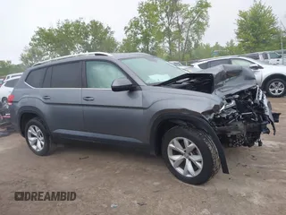 2018 Volkswagen Atlas SE z VIN 1V2KR2CAXJC517240, wystawiony jako IAAI lot #42361370 z przebiegiem 129 546 mil mil oraz . Historia ofert i sprzedaży dostępna na DreamBid. Obrazek 14.