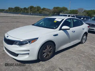 2018 Kia Optima LX with VIN 5XXGT4L33JG193537, listed as a IAAI auction lot 42033237 with 150,944 mi miles. Bid and sale history available at carsss.com. Image 2.
