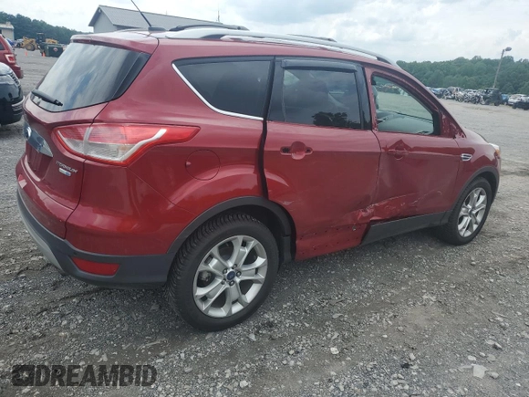 2016 Ford Escape Titanium with VIN 1FMCU9J90GUA02736, listed as a Copart auction lot 63068165 with 23,860 mi miles and Salvage title. Bid and sale history available at DreamBid. Image 3.