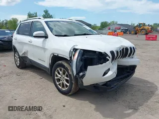 2015 Jeep Cherokee Latitude z VIN 1C4PJMCS3FW557734, wystawiony jako IAAI lot #42273937 z przebiegiem 168 828 mil mil oraz . Historia ofert i sprzedaży dostępna na DreamBid. Obrazek 1.