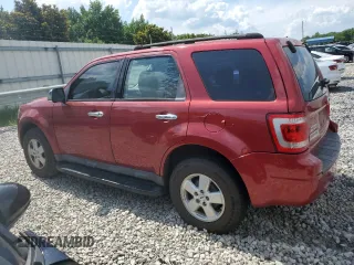 2009 Ford Escape XLS with VIN 1FMCU02739KA51016, listed as a Copart auction lot 63267285 with 152,559 mi miles and Salvage title. Bid and sale history available at DreamBid. Image 2.