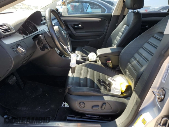 2013 Volkswagen CC R-Line z VIN WVWBN7AN1DE536851, wystawiony jako Copart lot #76972914 z przebiegiem 105 799 mil mil oraz Szkoda całkowita • Salvage title. Historia ofert i sprzedaży dostępna na DreamBid. Obrazek 7.