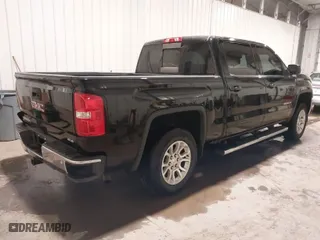 2017 GMC Sierra 1500 SLE with VIN 3GTU2MEC0HG498892, listed as a IAAI auction lot 40569861 with 125,321 mi miles. Bid and sale history available at carsss.com. Image 4.
