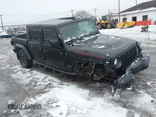 2021 Jeep Gladiator Rubicon z VIN 1C6JJTBG5ML605799, wystawiony jako IAAI lot #41190679 z przebiegiem 47 550 mil mil oraz . Historia ofert i sprzedaży dostępna na DreamBid. Obrazek 1.