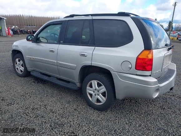 2004 GMC Envoy SLE with VIN 1GKDT13S642418153, listed as a IAAI auction lot 41660072 with 300,757 mi miles. Bid and sale history available at carsss.com. Image 3.