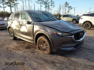 2019 Mazda CX-5 Touring with VIN JM3KFACM8K0694362, listed as a IAAI auction lot 41410185 with 89,443 mi miles. Bid and sale history available at carsss.com. Image 1.