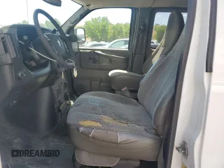 2015 Chevrolet Express Passenger LT with VIN 1GAZG1FG6F1217514, listed as a Copart auction lot 64759505 with 270,681 mi miles and Clean title. Bid and sale history available at DreamBid. Image 7.