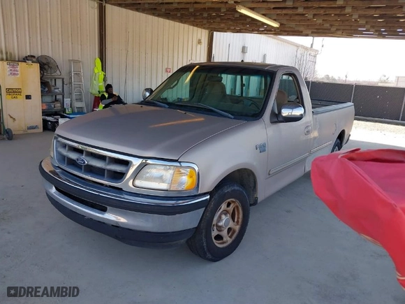 1998 Ford F-150 Standard with VIN 1FTZF1768WNA89026, listed as a IAAI auction lot 41673720 with 140,505 mi miles. Bid and sale history available at carsss.com. Image 2.