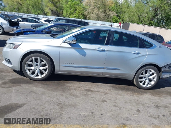 2015 Chevrolet Impala LTZ with VIN 2G1165S34F9101489, listed as a IAAI auction lot 42141525 with 149,037 mi miles and . Bid and sale history available at DreamBid. Image 15.