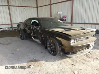 2021 Dodge Challenger R/T Scat Pack z VIN 2C3CDZFJ4MH680724, wystawiony jako IAAI lot #41125446 z przebiegiem 26 644 mil mil oraz . Historia ofert i sprzedaży dostępna na DreamBid. Obrazek 1.