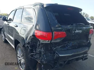 2018 Jeep Grand Cherokee Summit with VIN 1C4RJFJT5JC120523, listed as a IAAI auction lot 42136651 with 75,699 mi miles and . Bid and sale history available at DreamBid. Image 3.