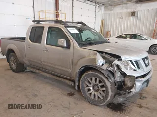 2010 Nissan Frontier SE with VIN 1N6AD0FV5AC439977, listed as a IAAI auction lot 41666404 with 152,004 mi miles and . Bid and sale history available at DreamBid. Image 1.