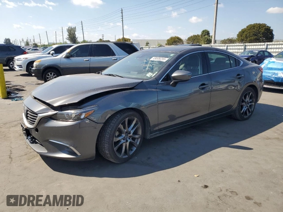 2017 Mazda 6 Grand Touring with VIN JM1GL1W5XH1133708, listed as a Copart auction lot 49009255 with 115,259 mi miles and Salvage Title. Bid and sale history available at carsss.com. Image 1.