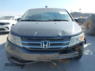 2012 Honda Odyssey EX-L with VIN 5FNRL5H69CB128585, listed as a IAAI auction lot 41695109 with 231,565 mi miles and . Bid and sale history available at carsss.com. Image 6.