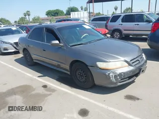 2001 Honda Accord LX with VIN 1HGCG16411A064182, listed as a IAAI auction lot 42174816 with 264,555 mi miles and . Bid and sale history available at DreamBid. Image 1.