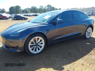 2022 Tesla Model 3 Long Range with VIN 5YJ3E1EB3NF309632, listed as a IAAI auction lot 41808987 with Not Provided miles and . Bid and sale history available at DreamBid. Image 2.