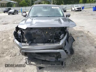 2022 Nissan Frontier SV with VIN 1N6ED1EK8NN680666, listed as a Copart auction lot 59164865 with 57,697 mi miles and Salvage title. Bid and sale history available at DreamBid. Image 5.
