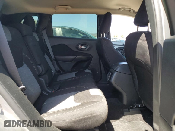 2015 Jeep Cherokee Sport with VIN 1C4PJMAB9FW545249, listed as a Copart auction lot 57528075 with 158,074 mi miles and Salvage title. Bid and sale history available at DreamBid. Image 11.