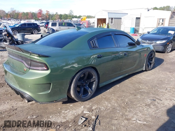 2019 Dodge Charger Scat Pack with VIN 2C3CDXGJ4KH572619, listed as a IAAI auction lot 40973015 with 40,148 mi miles and . Bid and sale history available at DreamBid. Image 4.