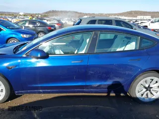 2023 Tesla Model 3 Long Range with VIN 5YJ3E1EB5PF623706, listed as a IAAI auction lot 41321269 with 21,081 mi miles and . Bid and sale history available at DreamBid. Image 14.