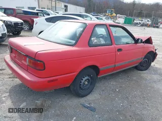 1993 Nissan Sentra z VIN 1N4EB32H7PC770697, wystawiony jako IAAI lot #41727754 z przebiegiem 210 152 mil mil oraz . Historia ofert i sprzedaży dostępna na DreamBid. Obrazek 4.