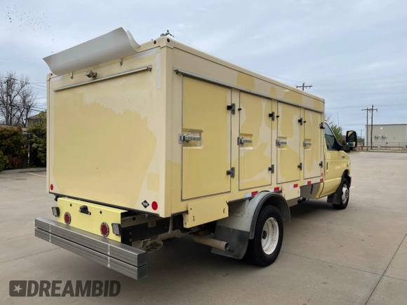 2021 Ford Econoline Cargo with VIN 1FDXE4FN8MDC34245, listed as a Copart auction lot 52241605 with 70,916 mi miles and Clean Title. Bid and sale history available at DreamBid. Image 4.