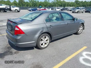 2012 Ford Fusion SE with VIN 3FAHP0HA0CR102548, listed as a IAAI auction lot 42628344 with 166,597 mi miles and . Bid and sale history available at DreamBid. Image 4.
