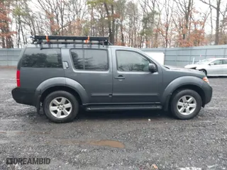 2012 Nissan Pathfinder SV with VIN 5N1AR1NBXCC611355, listed as a IAAI auction lot 41517590 with 128,870 mi miles. Bid and sale history available at carsss.com. Image 13.