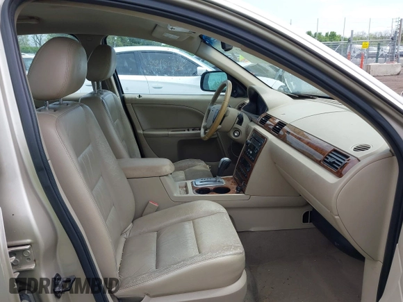 2006 Ford Five Hundred SEL with VIN 1FAFP24186G186073, listed as a IAAI auction lot 42156007 with 283,655 mi miles. Bid and sale history available at carsss.com. Image 5.